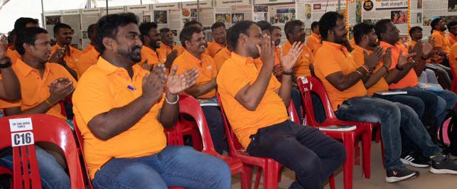 Migrant workers attending an event
