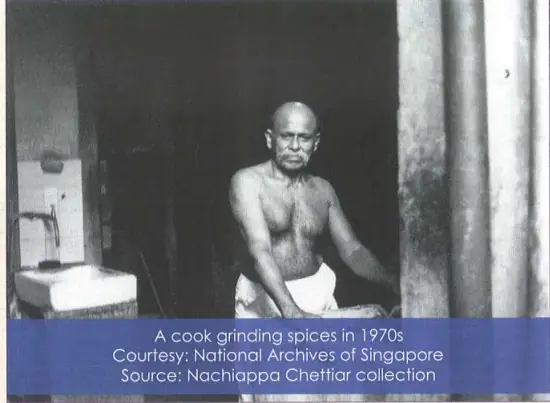 A cook grinding spices in 1970s