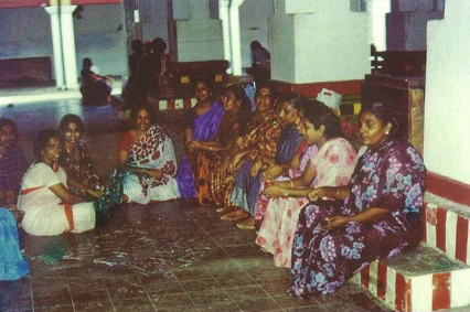 Nagarathar women seated at a temple function, Singapore