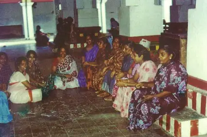 Nagarathar women seated at a temple function, Singapore