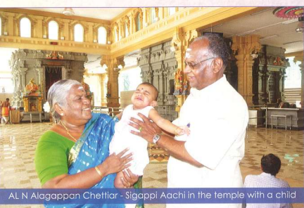 AL N Alagappan Chettiar and Sigappi Aachi at Sri Thendayuthapani Temple with a child